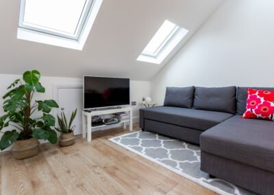 Loft Conversion in Fortis Green, London: roof window in living room