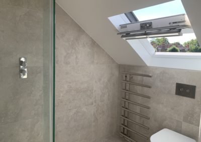 Loft Conversion near Chiswick Park London: bathroom roof window