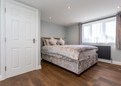 Loft Conversion near Carshalton: master bedroom interior design