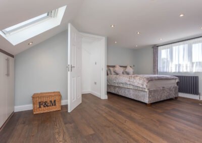 Loft Conversion in Carshalton, London: master bedroom interior design