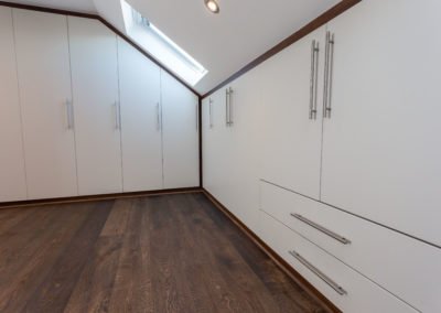 Loft Conversion Carshalton: bedroom built-in wardrobe
