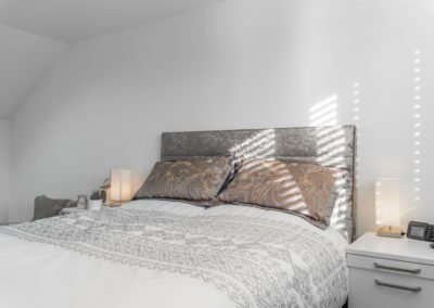 Loft Conversion North Finchley in London: master bedroom decor details
