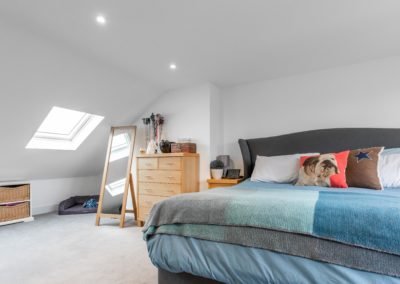 Loft Conversion in Twickenham: modern bedroom decor